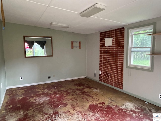 1511 Polk St, Warsaw, MO 65355 - spare room with unfinished concrete floors and baseboards