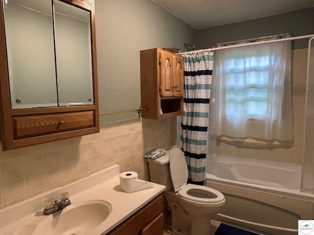 1511 Polk St, Warsaw, MO 65355 - bathroom with shower / tub combo with curtain, vanity, toilet, tile walls, and tasteful backsplash