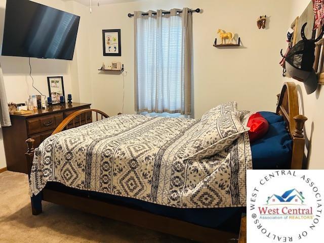 913 S Main St, Milan, MO 63556 - bedroom featuring carpet floors
