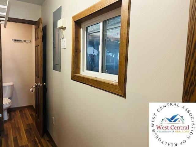 913 S Main St, Milan, MO 63556 - hallway featuring dark wood-style floors