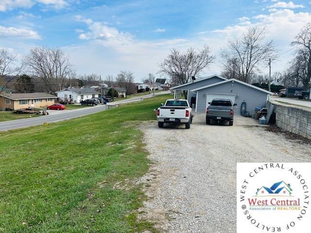913 S Main St, Milan, MO 63556 - view of road with a residential view