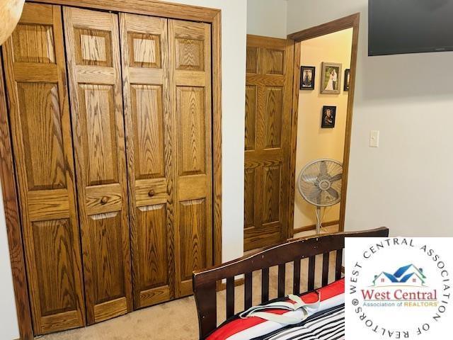 913 S Main St, Milan, MO 63556 - bedroom with light carpet