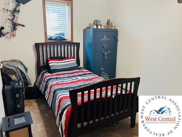 913 S Main St, Milan, MO 63556 - view of carpeted bedroom