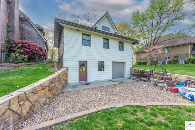 1715 Sycamore Dr, Sedalia, MO 65301 - rear view of property featuring cooling unit, a yard, and a patio