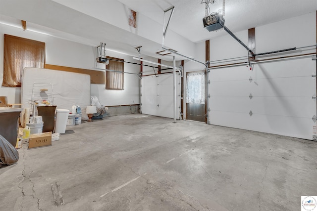 1715 Sycamore Dr, Sedalia, MO 65301 - garage featuring a garage door opener
