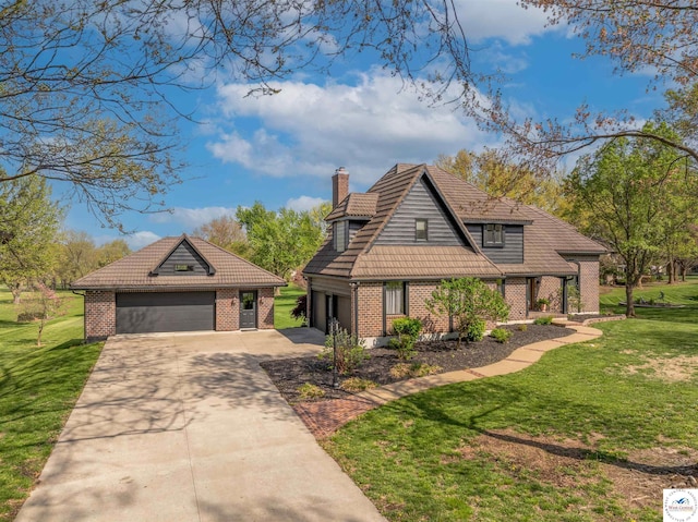 1715 Sycamore Dr, Sedalia, MO 65301 - view of front of house with a chimney, brick siding, a garage, a front yard, and concrete driveway