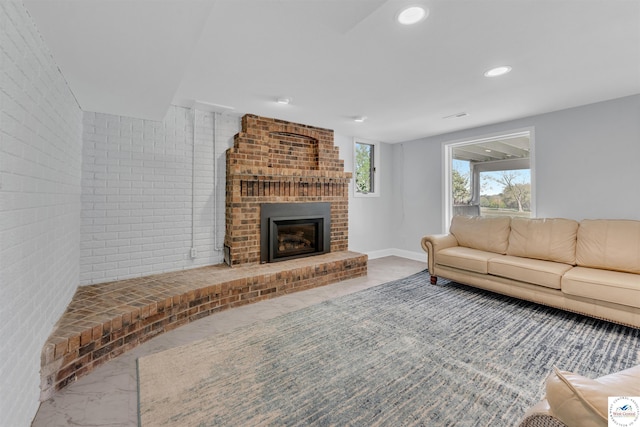 1715 Sycamore Dr, Sedalia, MO 65301 - living area with baseboards, recessed lighting, a fireplace, and marble finish floor