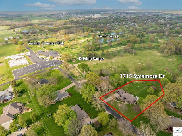1715 Sycamore Dr, Sedalia, MO 65301 - drone / aerial view with a water view