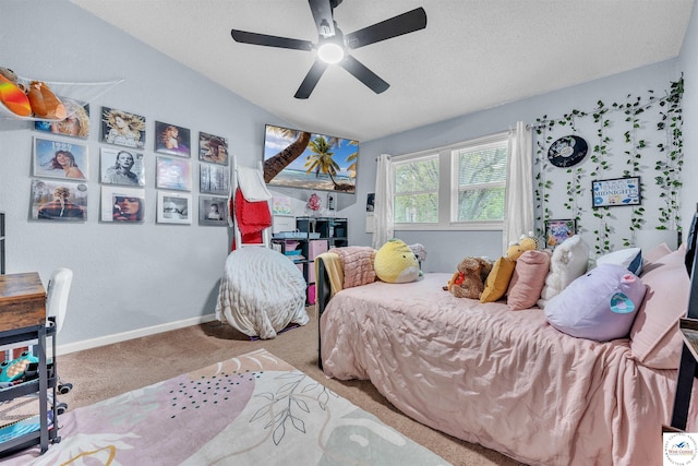 2510 Stephenson Ave, Sedalia, MO 65301 - bedroom featuring carpet floors, a textured ceiling, a ceiling fan, baseboards, and vaulted ceiling