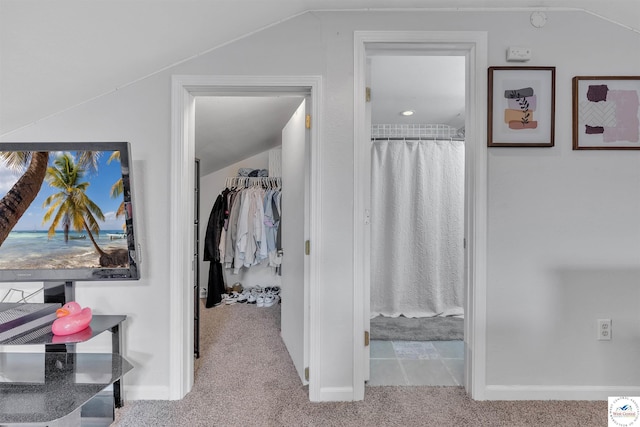2510 Stephenson Ave, Sedalia, MO 65301 - corridor featuring carpet flooring, vaulted ceiling, and baseboards