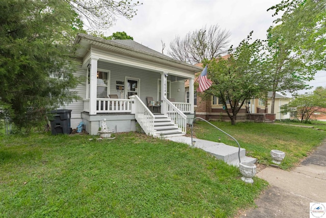 view of front facade with a porch and a front yard