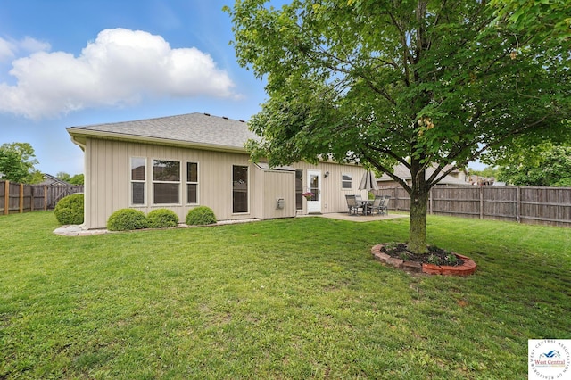 113 NW Michael Dr, Grain Valley, MO 64029 - rear view of house with a patio and roof with shingles