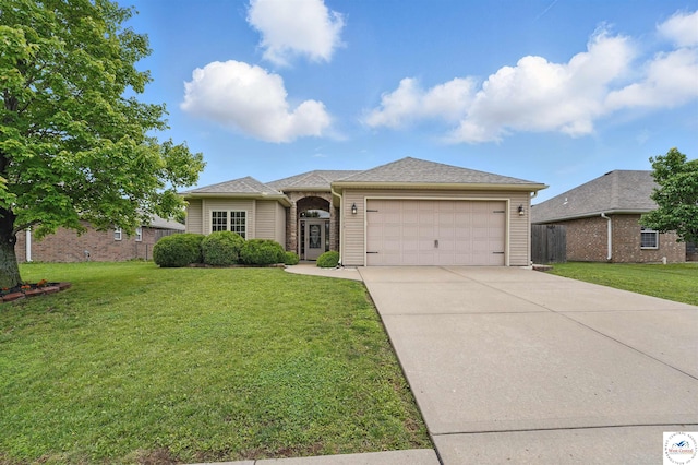 113 NW Michael Dr, Grain Valley, MO 64029 - single story home with a garage, driveway, and a front lawn