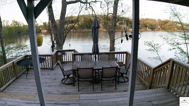 31560 Branch Ave, Warsaw, MO 65355 - wooden deck featuring outdoor dining space and a water view
