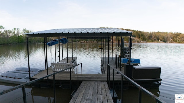 31560 Branch Ave, Warsaw, MO 65355 - dock area featuring boat lift and a water view
