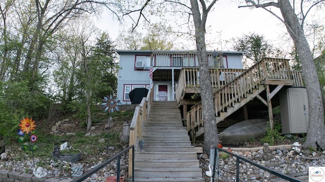 31560 Branch Ave, Warsaw, MO 65355 - view of front of home featuring a wooden deck and stairway