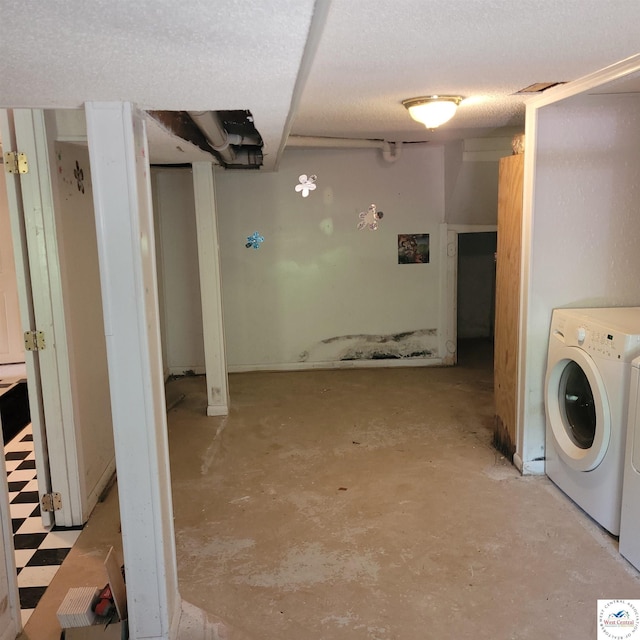 washroom featuring washing machine and clothes dryer