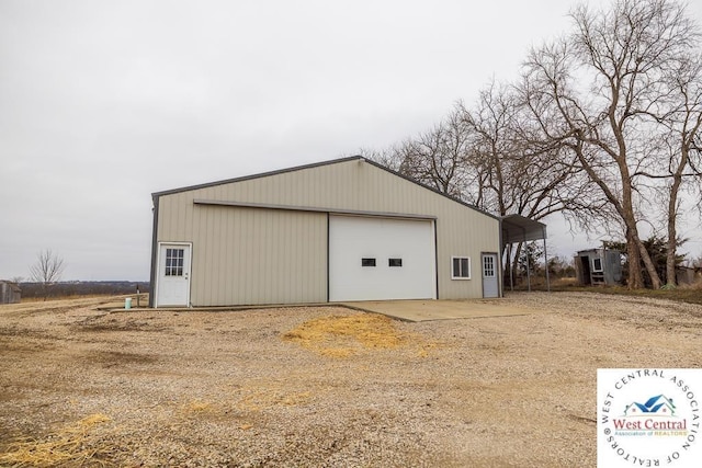 exterior space featuring driveway and a garage