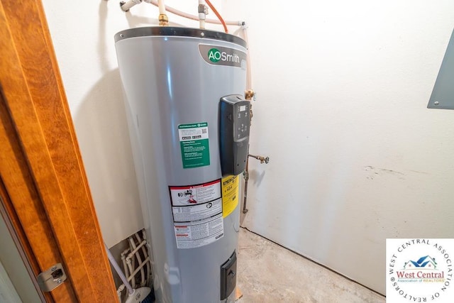 utility room with electric water heater