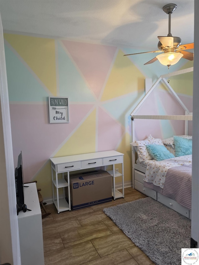 1010 NW Scenic Dr, Grain Valley, MO 64029 - bedroom featuring ceiling fan and baseboards