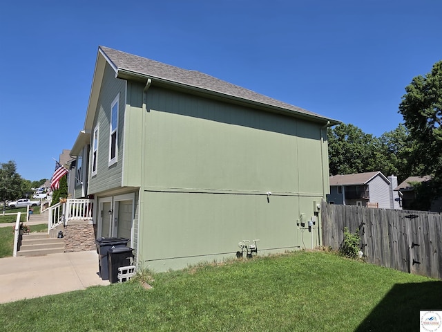 1010 NW Scenic Dr, Grain Valley, MO 64029 - view of property exterior with a patio area