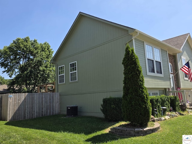 1010 NW Scenic Dr, Grain Valley, MO 64029 - view of home's exterior featuring a central air condition unit