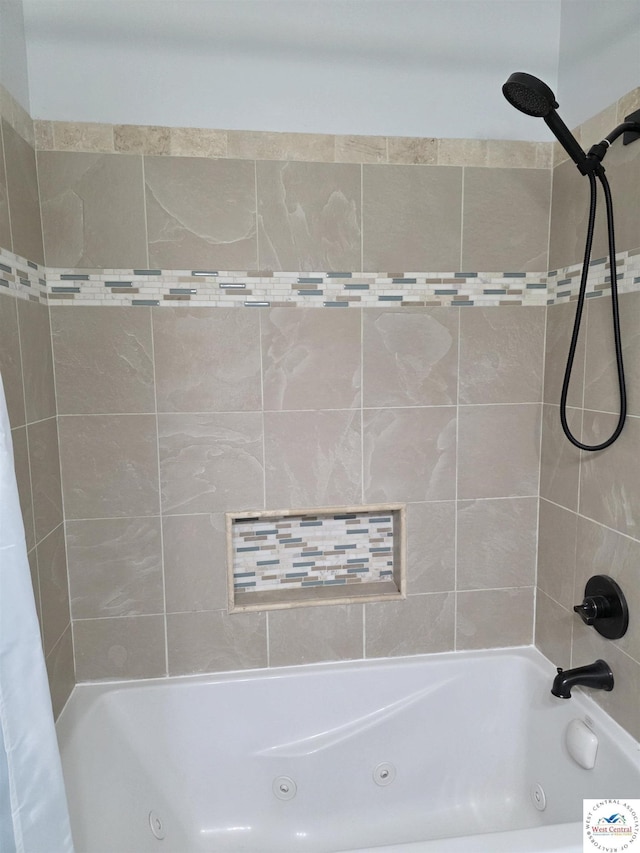 1010 NW Scenic Dr, Grain Valley, MO 64029 - bathroom featuring a combined bath / shower with jetted tub