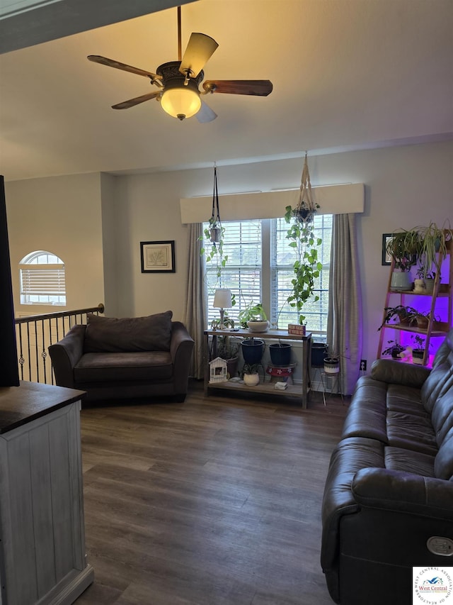 1010 NW Scenic Dr, Grain Valley, MO 64029 - living area featuring dark wood-style flooring and a ceiling fan