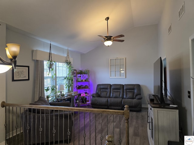 1010 NW Scenic Dr, Grain Valley, MO 64029 - living area with lofted ceiling, a ceiling fan, and wood finished floors