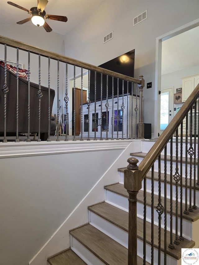 1010 NW Scenic Dr, Grain Valley, MO 64029 - staircase with ceiling fan