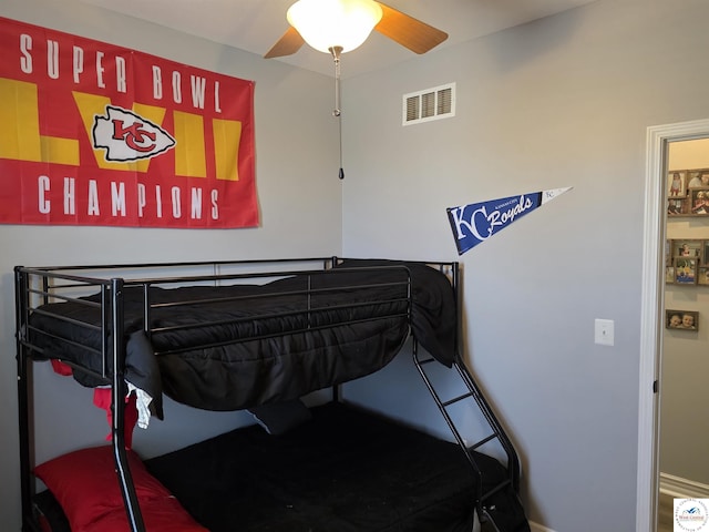 1010 NW Scenic Dr, Grain Valley, MO 64029 - bedroom featuring ceiling fan and baseboards