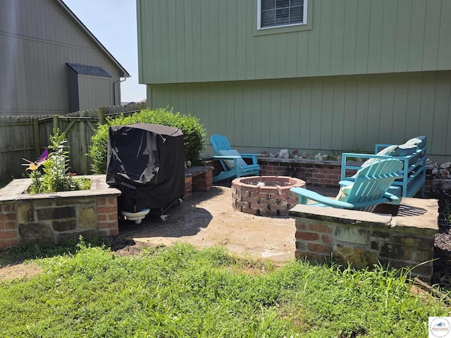 1010 NW Scenic Dr, Grain Valley, MO 64029 - view of patio / terrace featuring a fire pit