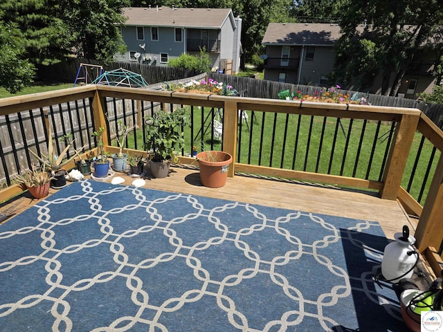1010 NW Scenic Dr, Grain Valley, MO 64029 - wooden deck with a fenced backyard