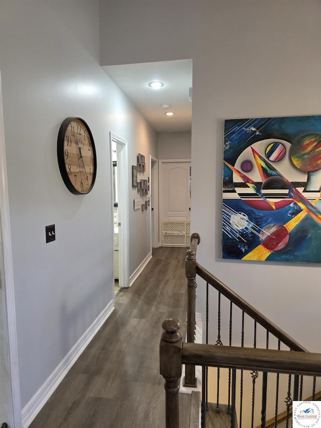 1010 NW Scenic Dr, Grain Valley, MO 64029 - hallway featuring dark wood-type flooring, an upstairs landing, and recessed lighting