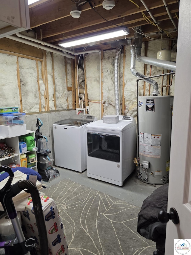 1010 NW Scenic Dr, Grain Valley, MO 64029 - washroom featuring water heater and washing machine and clothes dryer