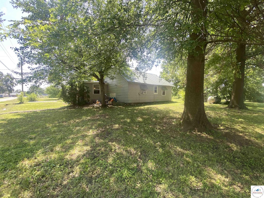 207 W 2nd St, Lowry City, MO 64763 - view of grassy yard