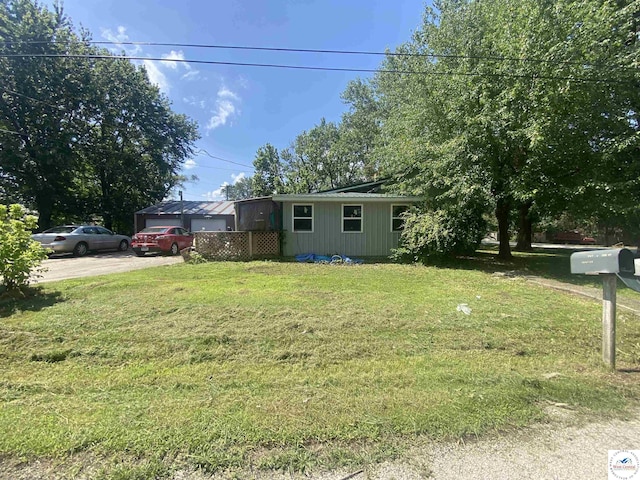 207 W 2nd St, Lowry City, MO 64763 - view of front of home featuring a front yard