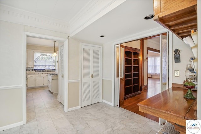 503 S 2nd St, Clinton, MO 64735 - hallway with healthy amount of natural light, ornamental molding, and baseboards