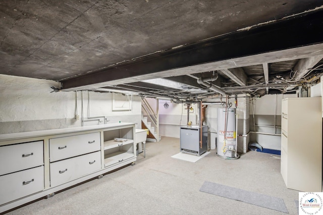 503 S 2nd St, Clinton, MO 64735 - unfinished basement featuring gas water heater and stairway