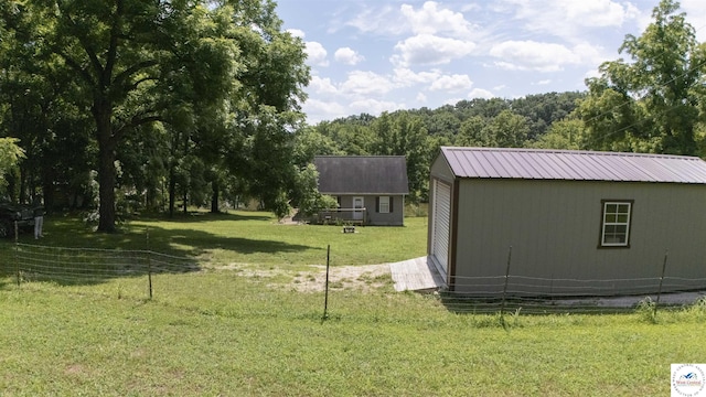29139 Sandy Ln, Lincoln, MO 65338 - view of yard with an outdoor structure