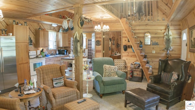 29139 Sandy Ln, Lincoln, MO 65338 - living area with a chandelier, wood walls, healthy amount of natural light, wooden ceiling, and carpet floors
