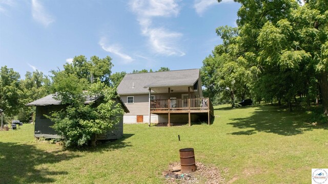 29139 Sandy Ln, Lincoln, MO 65338 - rear view of house with a wooden deck and a yard