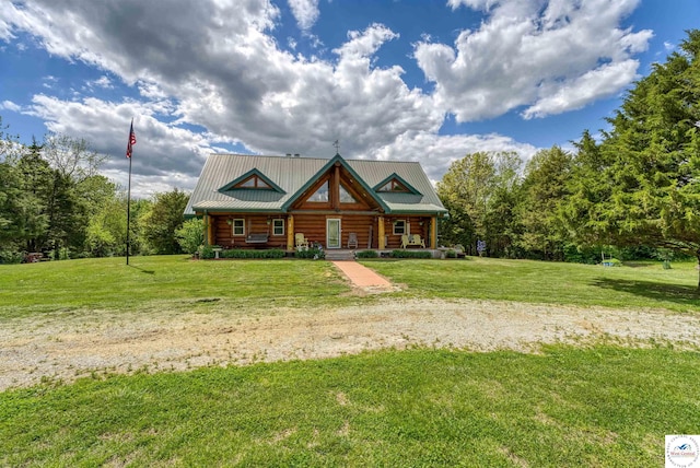 1244 SW 101st Rd, Chilhowee, MO 64733 - snow covered house featuring log siding and metal roof