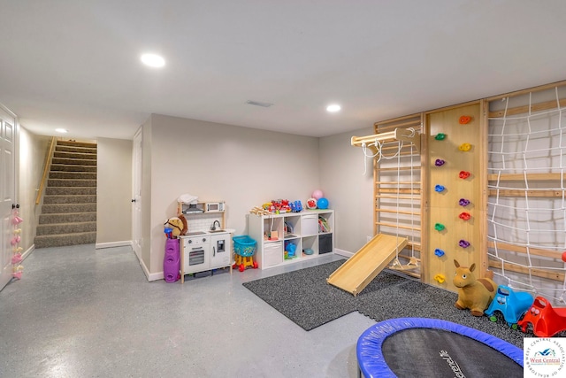 rec room featuring recessed lighting, visible vents, speckled floor, and baseboards