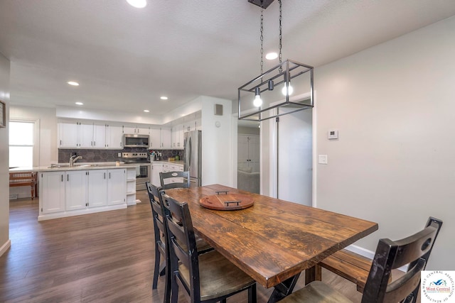 dining space featuring recessed lighting, visible vents, and dark wood finished floors