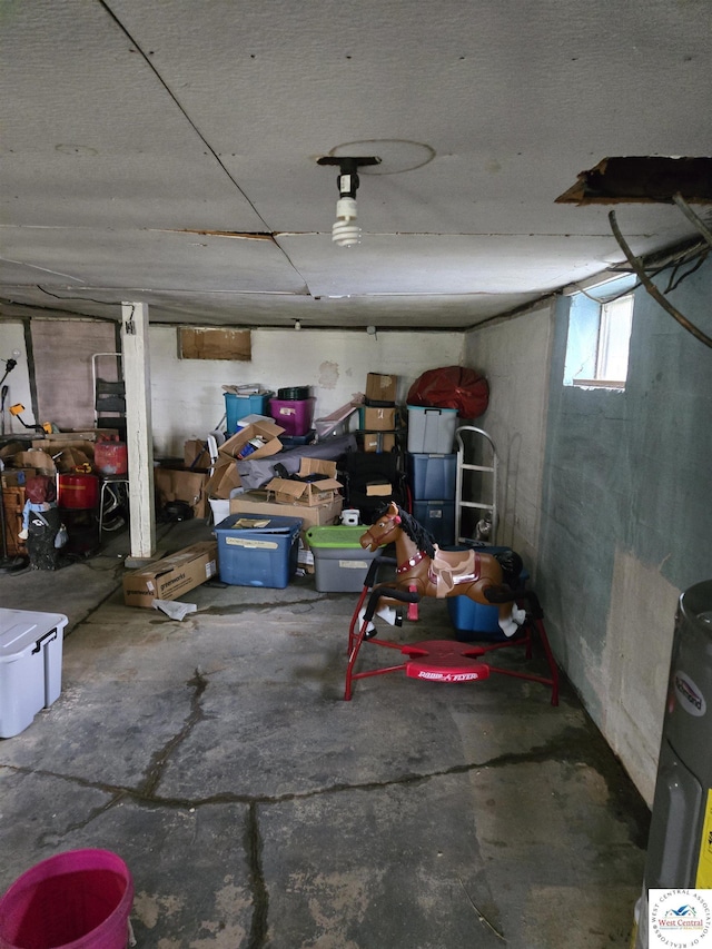 garage featuring electric water heater
