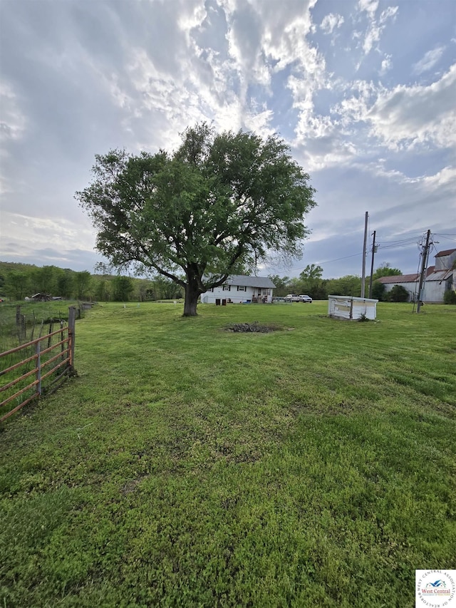 view of yard with fence
