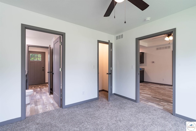 704 E 16th St, Sedalia, MO 65301 - unfurnished bedroom with light carpet and baseboards
