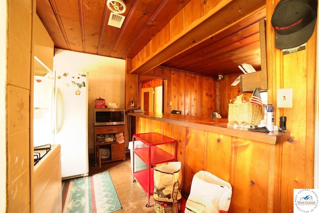 21609 Valley Rd, Warsaw, MO 65355 - interior space featuring visible vents, wooden ceiling, and wooden walls