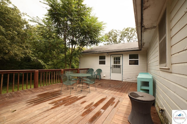 21609 Valley Rd, Warsaw, MO 65355 - wooden terrace featuring outdoor dining space